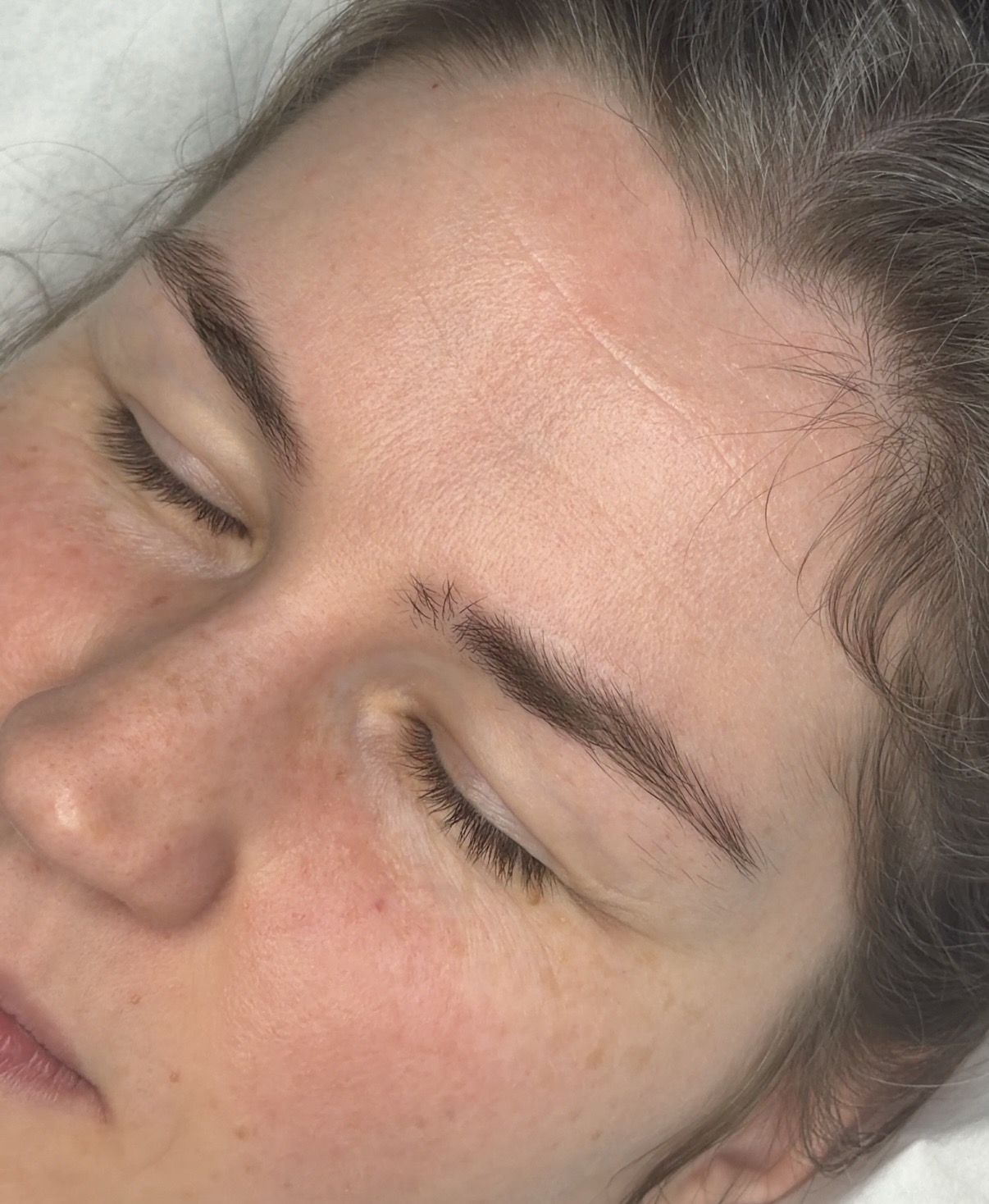 Client's brows before shaping and tint